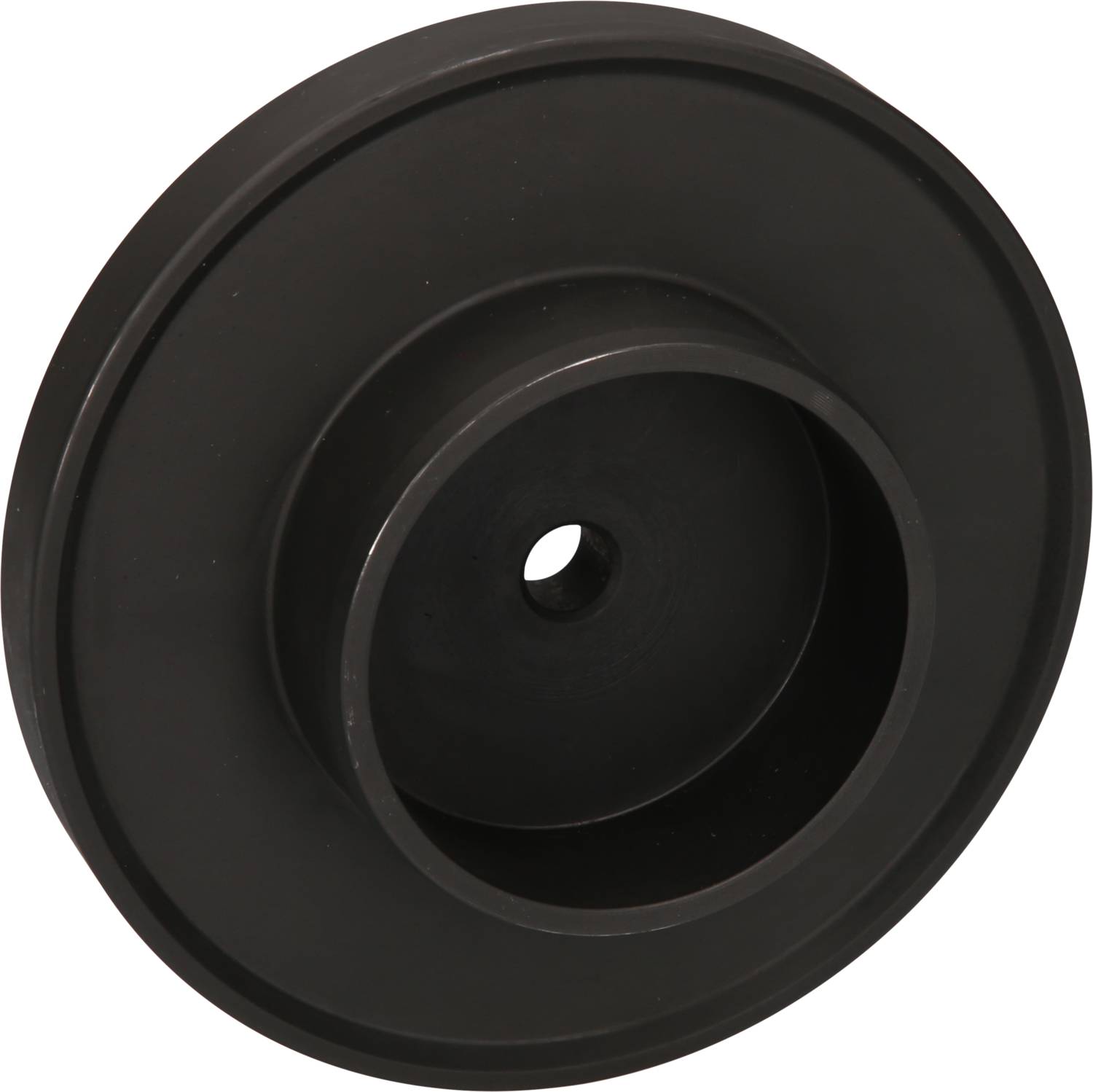 Schwarzes rundes Metallteil mit Loch in der Mitte, möglicherweise ein Maschinenteil oder eine Scheibe.