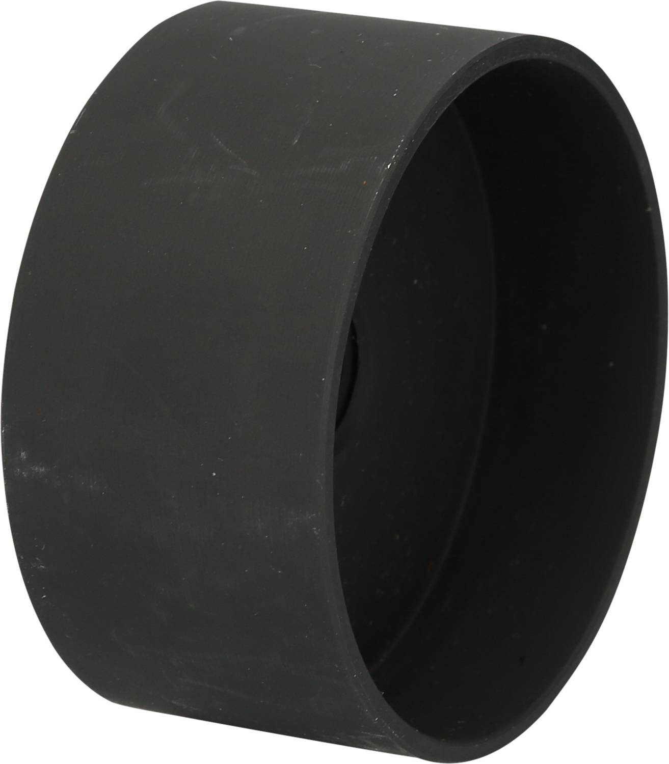 Schwarzes, zylindrisches Rad, aus Kunststoff, vor neutralem Hintergrund platziert.