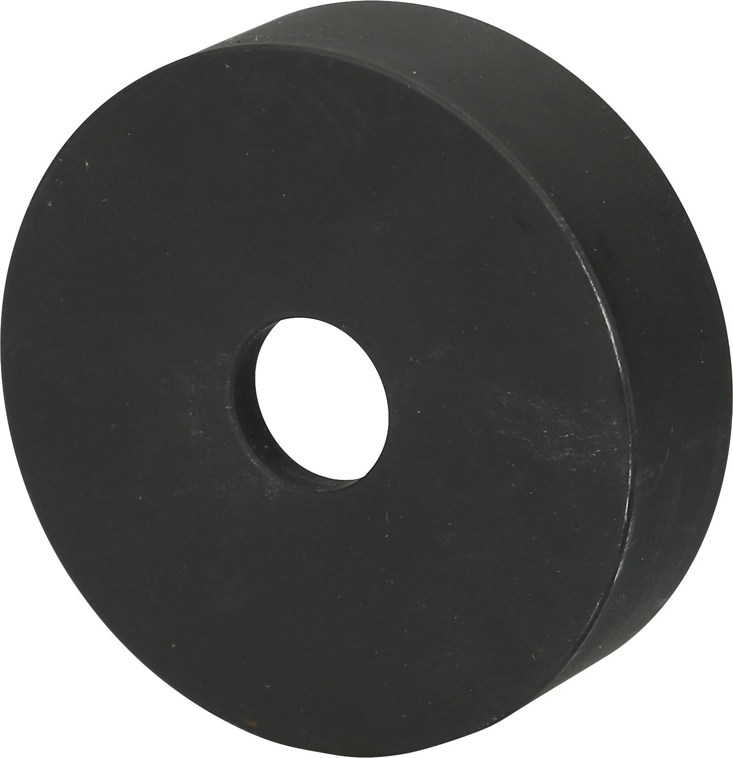 Rundes schwarzes Objekt mit einem Loch in der Mitte.