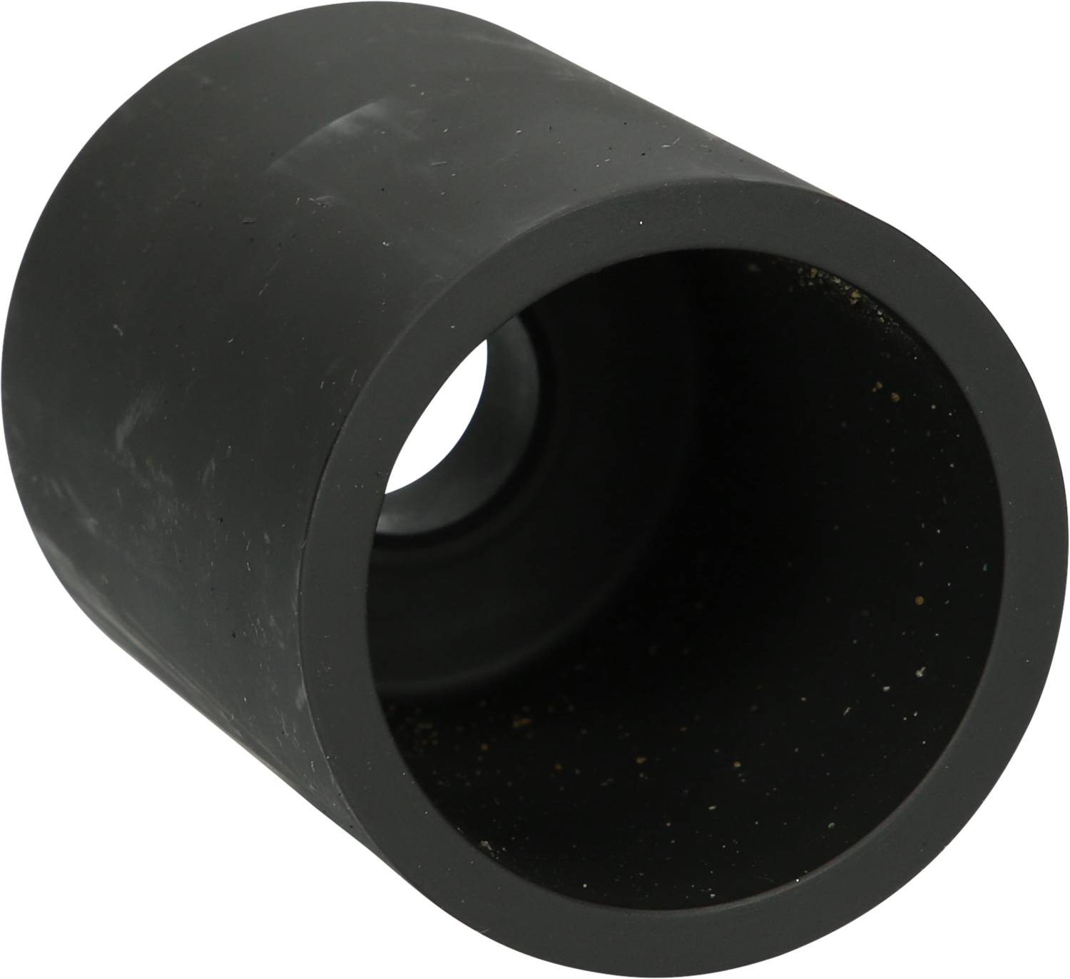 Ein schwarzes, zylindrisches Objekt mit einem Hohlraum in der Mitte, möglicherweise ein Teil eines größeren mechanischen Systems.