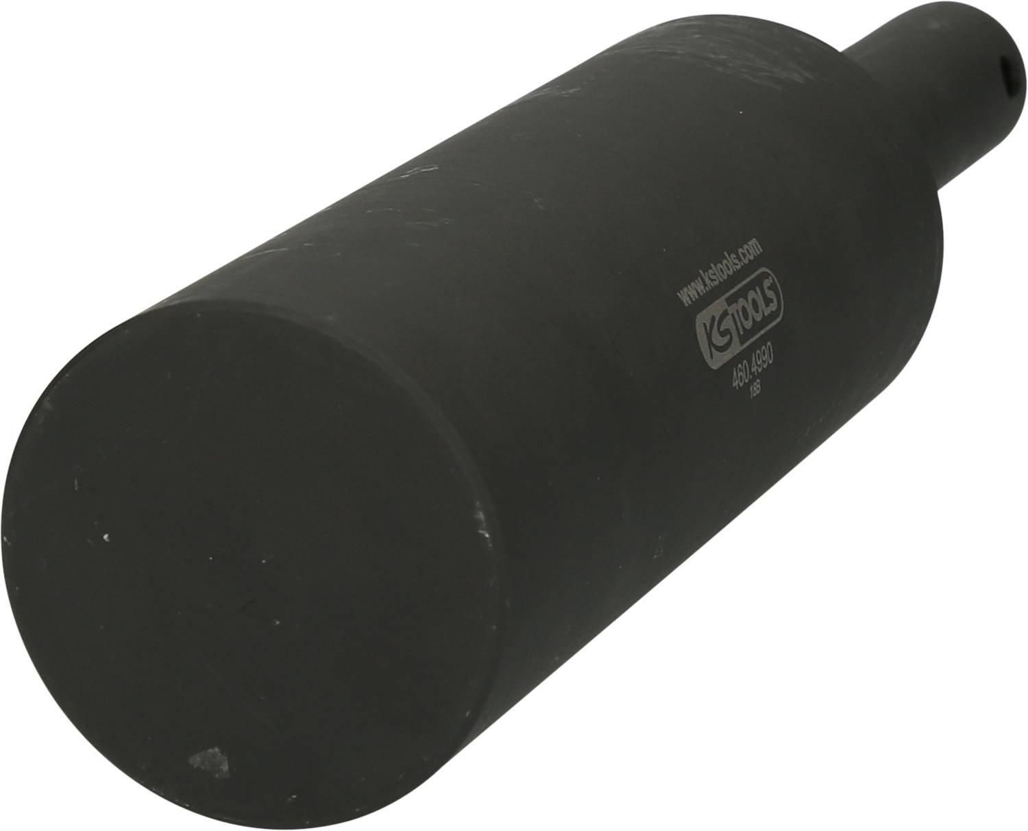 Ein schwarzer metallischer Zylinder.