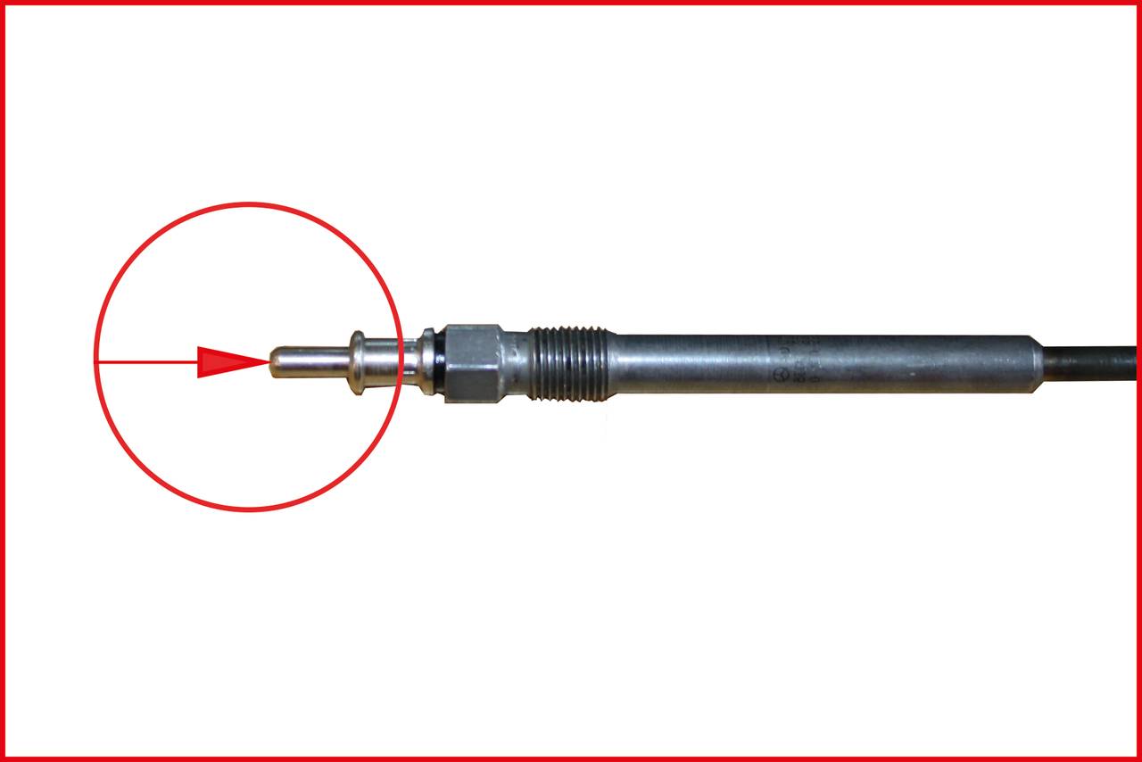 Metallschraube mit Vergrößerung der Spitze, die auf Details der Konstruktion hinweist.