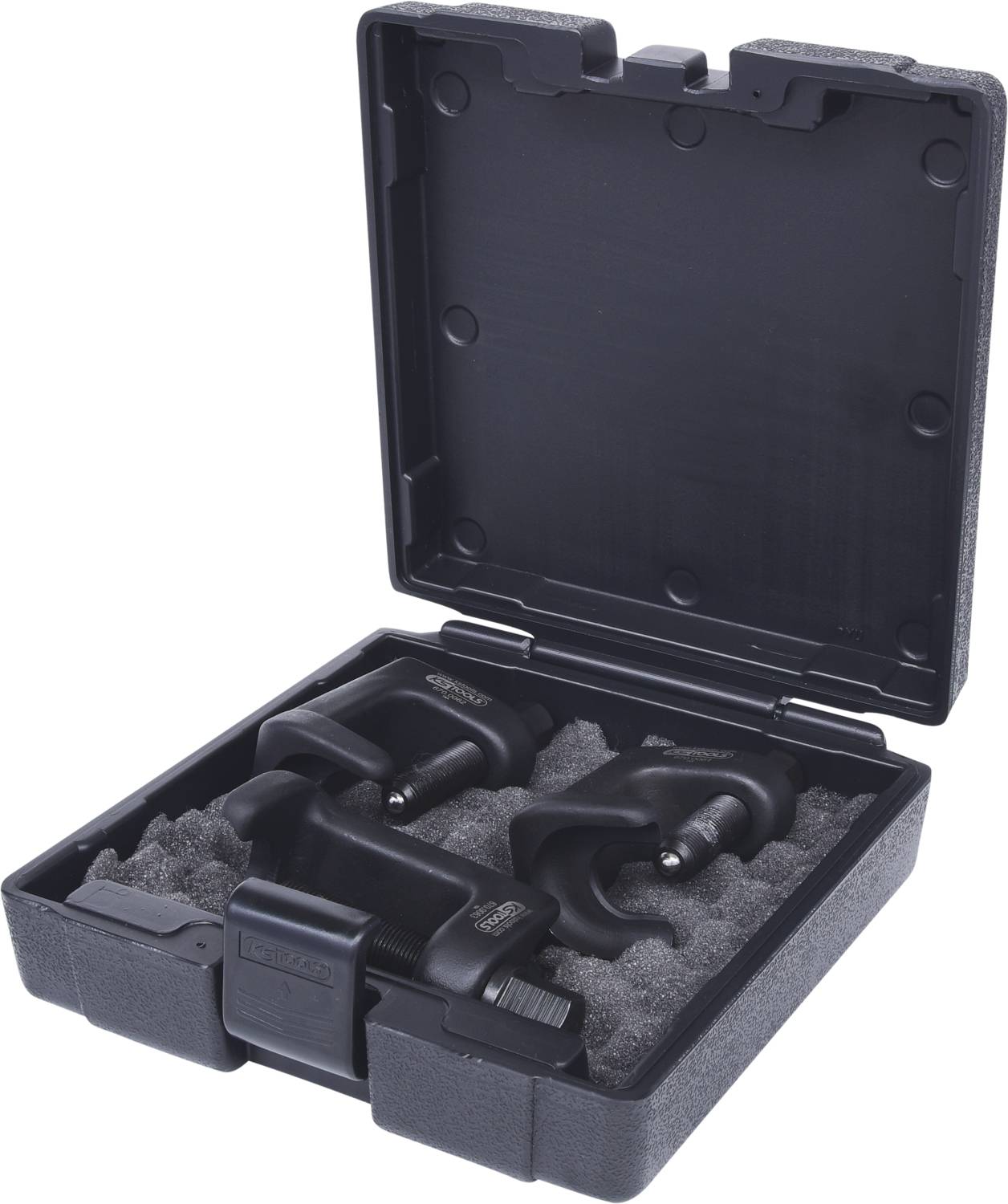 Ein offener schwarzer Koffer mit Schaumstoffeinlage, die vier schwarze Metallklemmen sicher hält. Klemmen haben drehbare Schraubmechanismen.