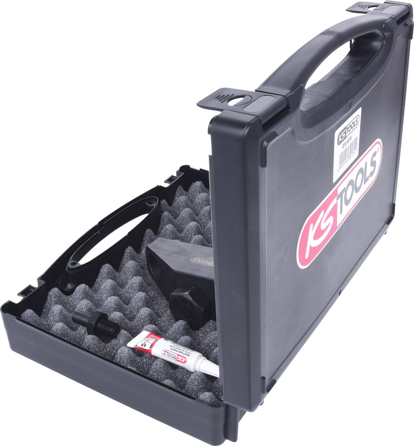 Offener schwarzer Werkzeugkoffer von KS Tools mit Schaumstoffeinlage, enthält ein Werkzeugteil und eine Tube Paste.