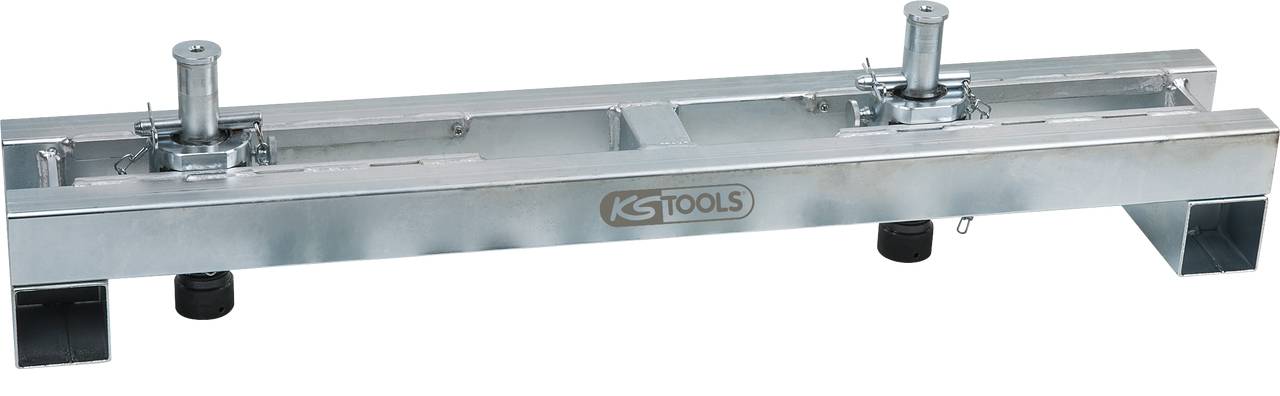 Ein silberfarbenes Werkzeug mit zwei justierbaren Hebeln auf einem rechteckigen Rahmen, trägt das Logo 'KS Tools'. Hauptsächlich aus Metall.