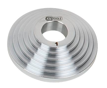 Metallischer Abstandsring mit konzentrischen Rillen und einem zentralen Loch. Oben ist das Logo 'KS TOOLS' sichtbar.