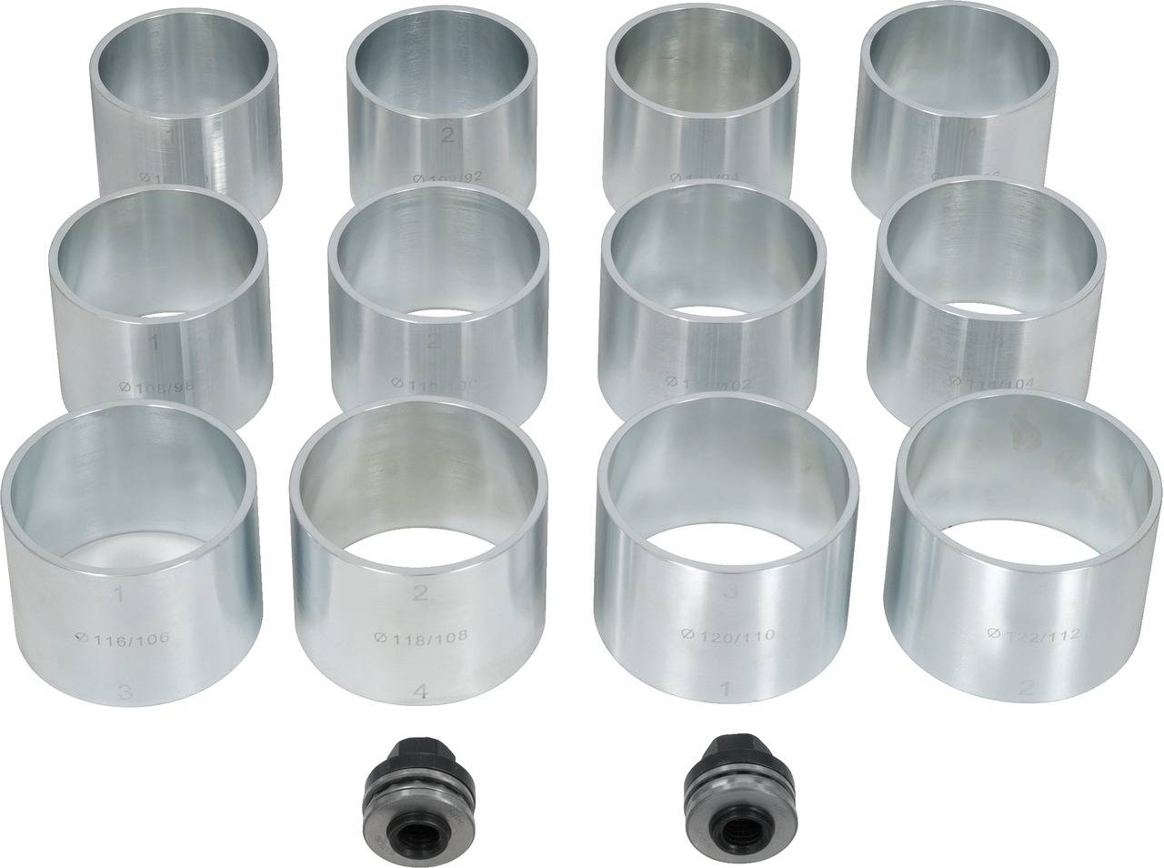 Zwölf silberne Metallringe in drei Reihen angeordnet, mit zwei schwarzen Befestigungselementen unten. Ringe scheinen nummeriert zu sein.