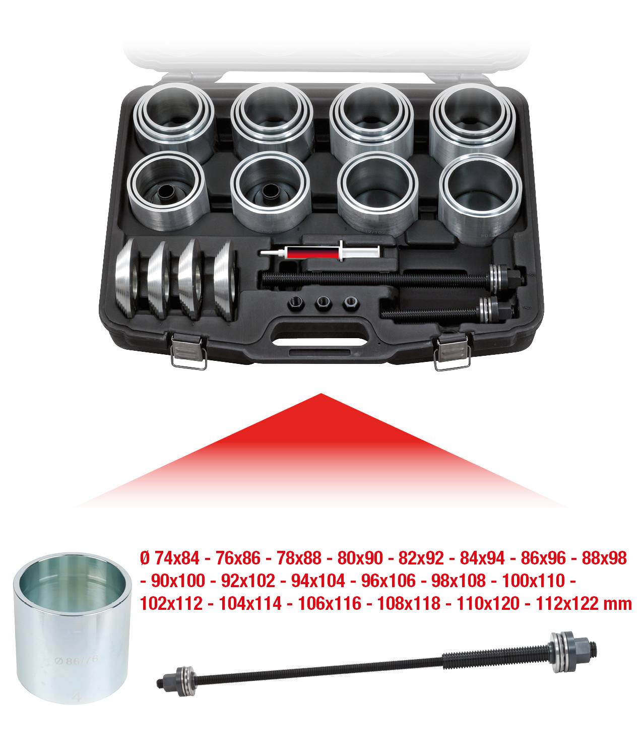 Ein Set von Metallbuchsen unterschiedlicher Größe in einem offenen Werkzeugkoffer. Ein langer Metallstift liegt daneben.