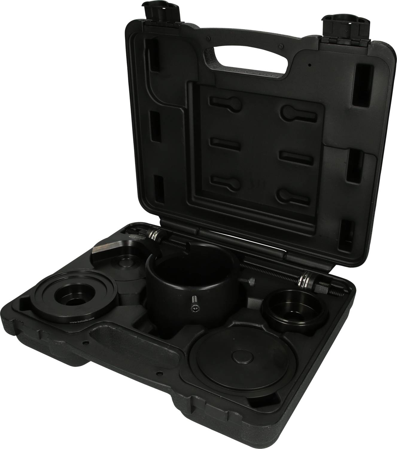 Ein offener schwarzer Kunststoffkoffer mit verschiedenen kreisförmigen Werkzeugen und Zubehörteilen, die sauber einsortiert sind.