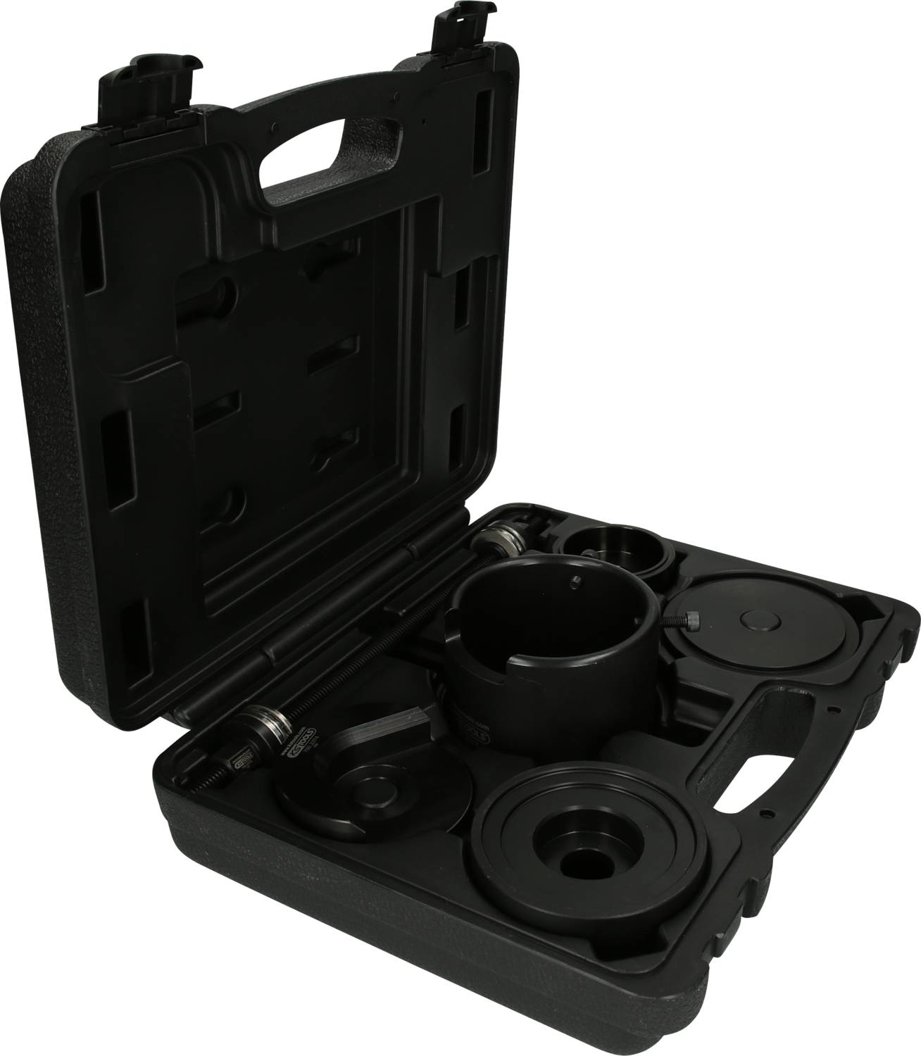 Schwarzer Werkzeugkoffer mit geöffnetem Deckel, zeigt mehrere runde Metallwerkzeuge, die sicher in passgenauen Fächern liegen.