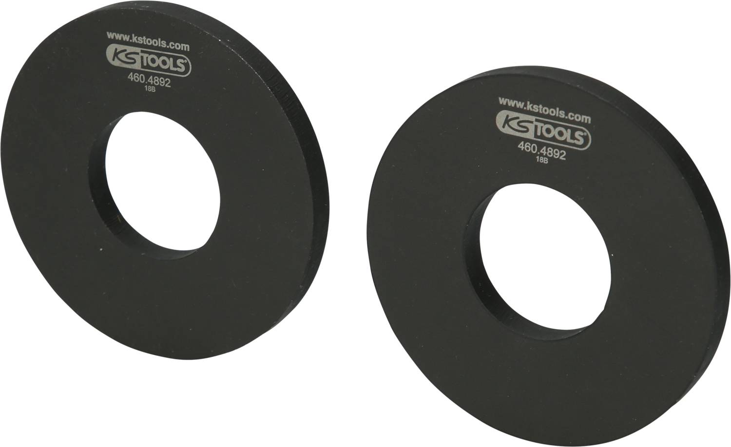 Zwei schwarze Metallringe mit Loch in der Mitte, Aufschrift 'KS Tools' und Produktnummer '460.4892'. Werkzeugzubehör.