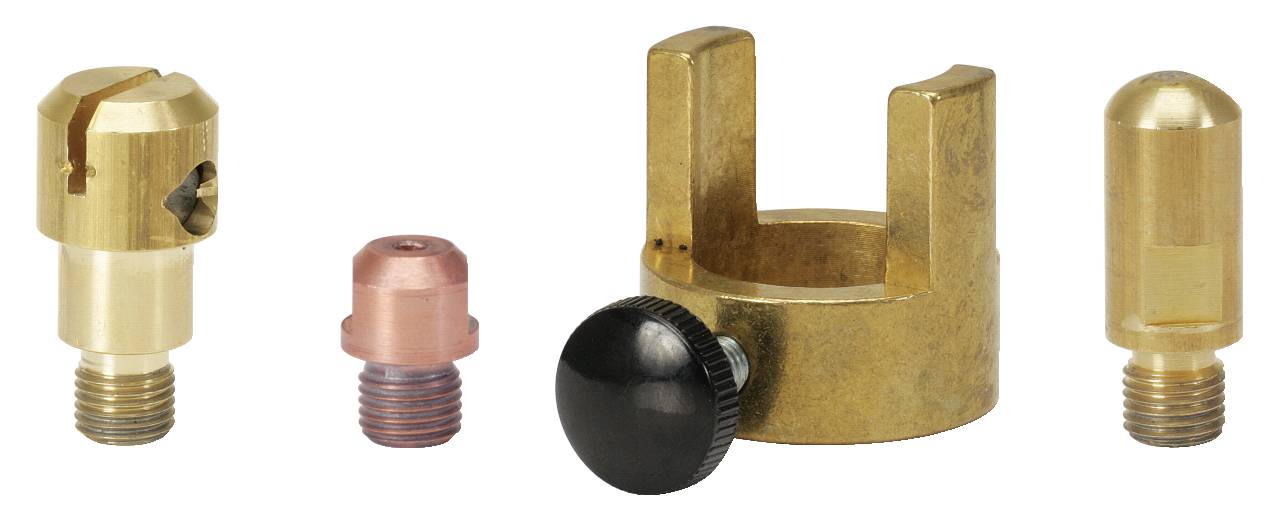 Vier verschiedene Metallaufsätze: zwei zylindrische, einer mit einem Schlitz, und ein halbrunder Kopf. Eine goldene Halterung mit Schraube.