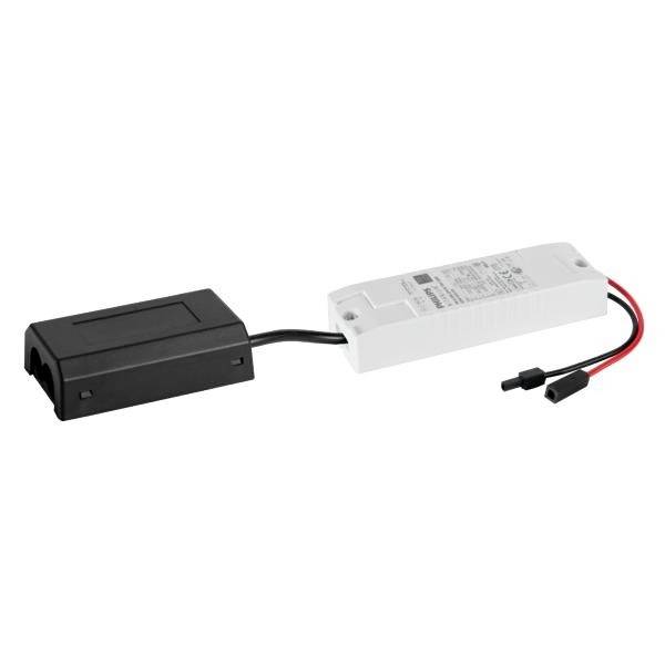 Schwarzes und weißes rechteckiges Elektronikgehäuse mit Kabeln; vermutlich ein Stromversorgungsteil oder Transformator.