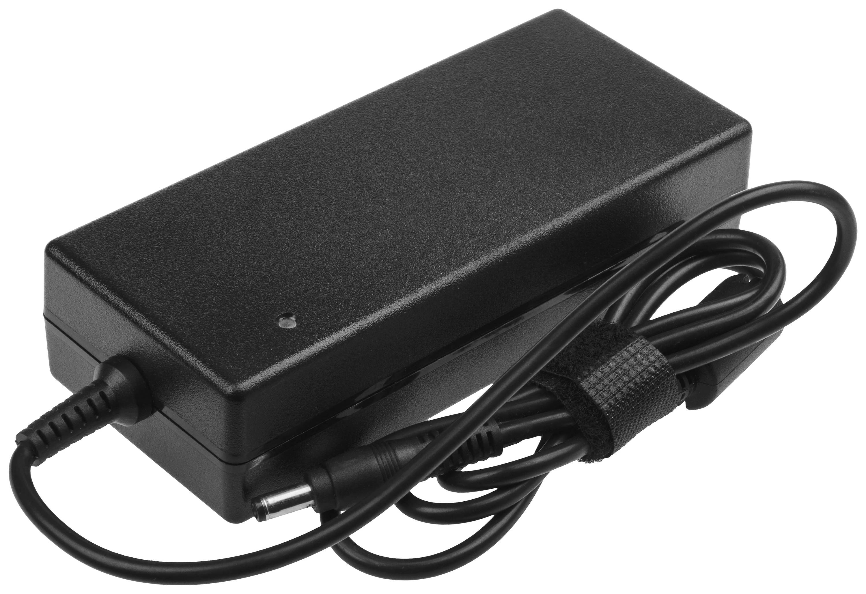 Ein schwarzes Laptop-Netzteil mit angeschlossenem Kabel, gewickelt und von einem Klettverschlussband gehalten.
