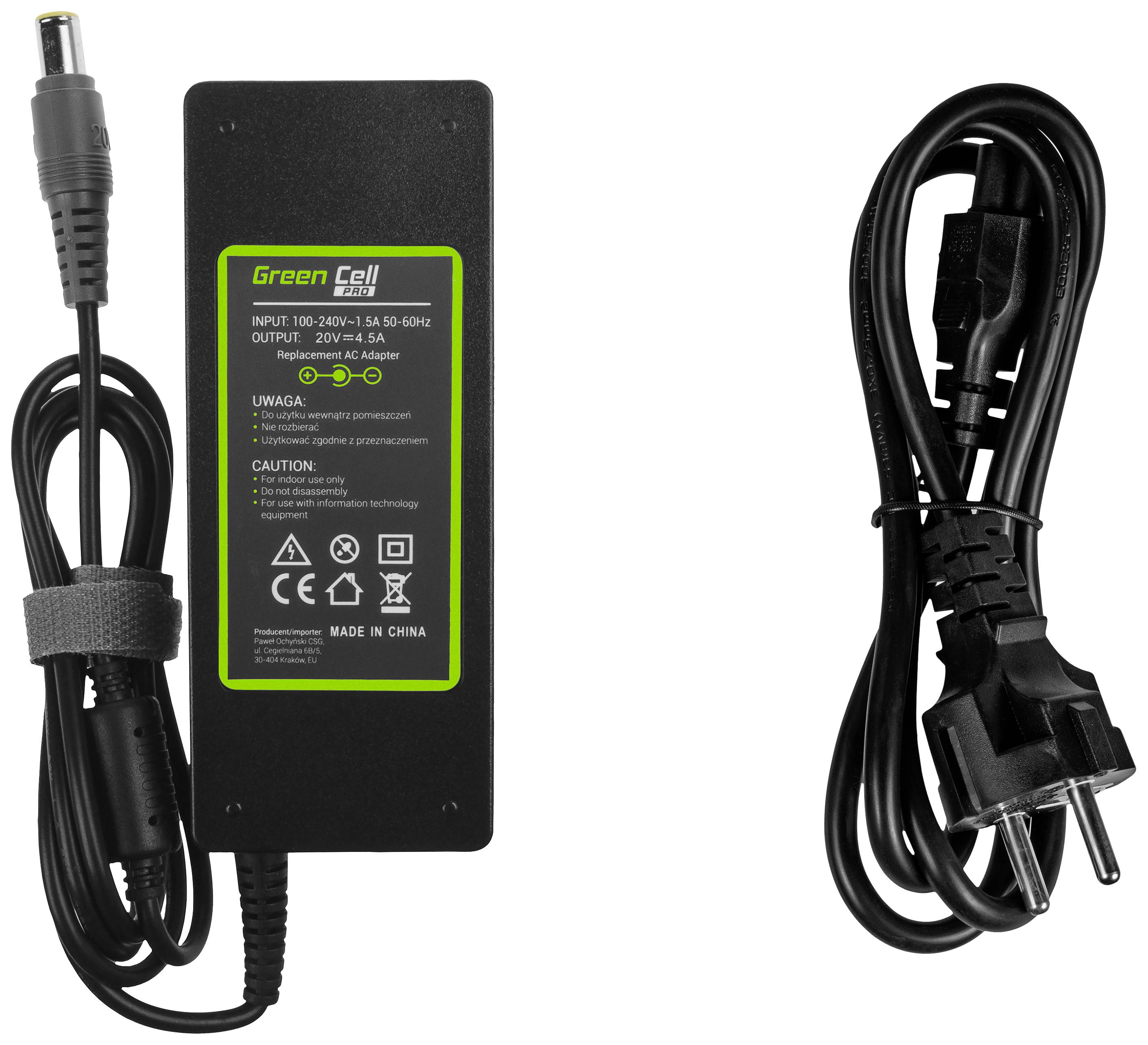 Netzteil mit Kabel, Modell 'Green Cell'. Aufschrift zeigt Eingangs- und Ausgangsspannung. Enthält Sicherheits- und Herkunftshinweise.