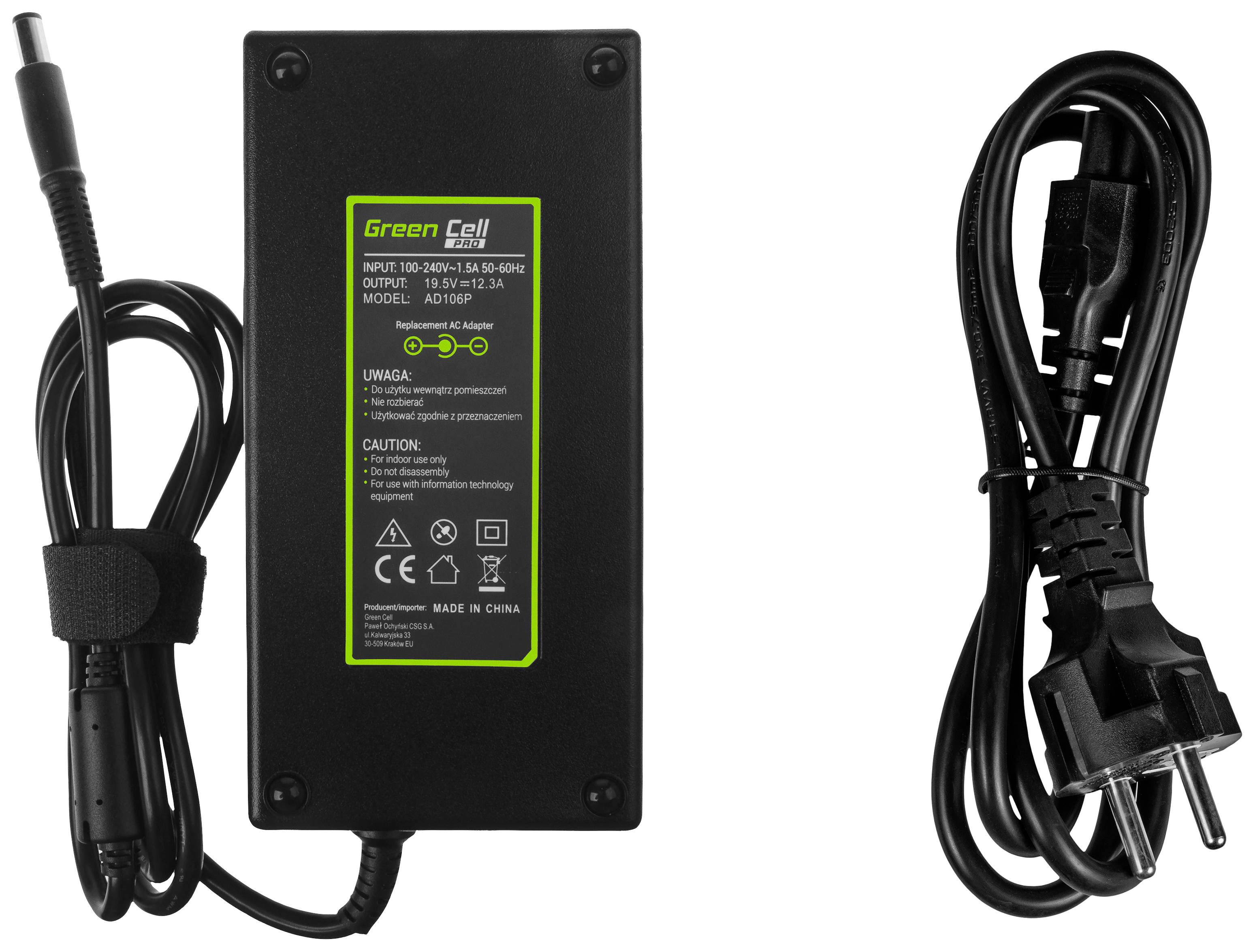 Schwarzes Laptop-Ladegerät mit Kabel, Modell 'Green Cell'. Angaben zur Spannung, Stromstärke, Sicherheitswarnungen und CE-Kennzeichnung sichtbar.