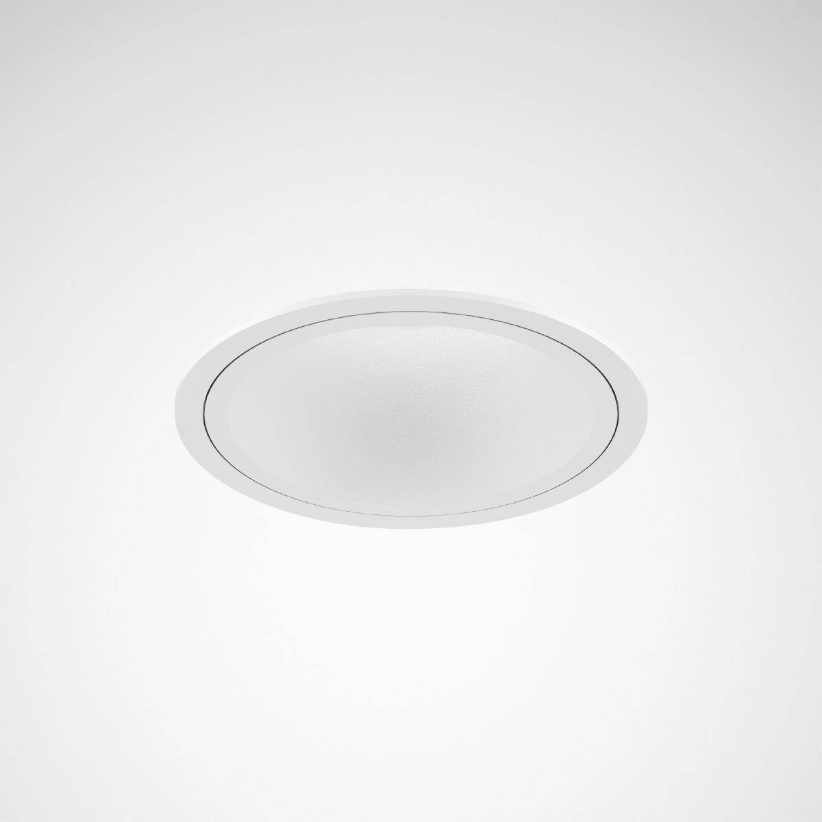 Ein weißer, runder Deckenstrahler mit schlichtem Design strahlt diffuses Licht in einen Raum aus.