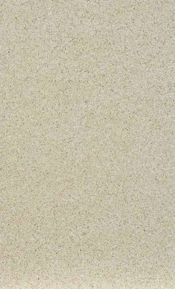 Beiger, körniger Sand mit vereinzelten rosa und grauen Flecken.