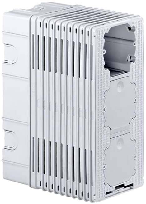 Ein rechteckiges, graues Plastikgehäuse mit mehreren Rippen und zwei großen runden Öffnungen auf der Vorderseite, zur elektrischen Montage.