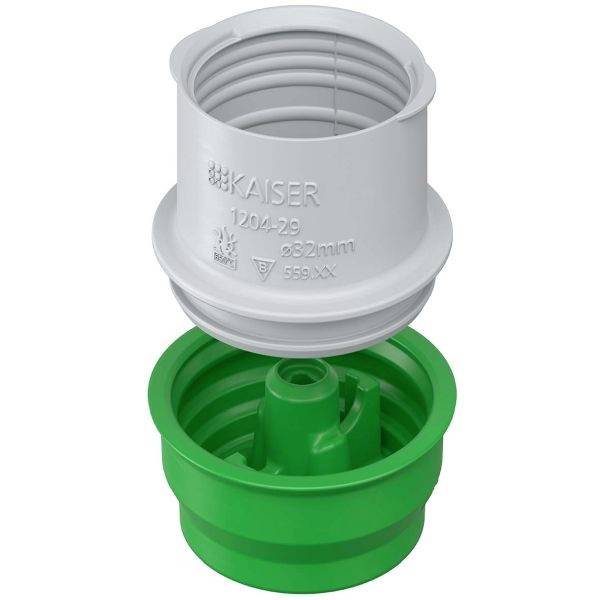 Ein grauer Kunststoffadapter von KAISER mit grünem Einsatz, verwendet für Installation und Anpassung in Elektroanwendungen.