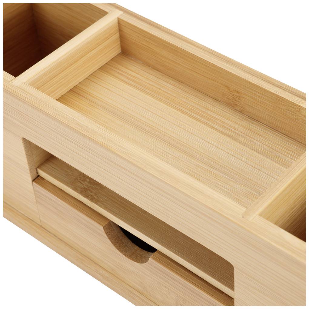 Holzschublade aus hellem Bambus mit offenem Fach und integriertem Griff. Geeignet zur Aufbewahrung kleinerer Gegenstände wie Schreibutensilien.