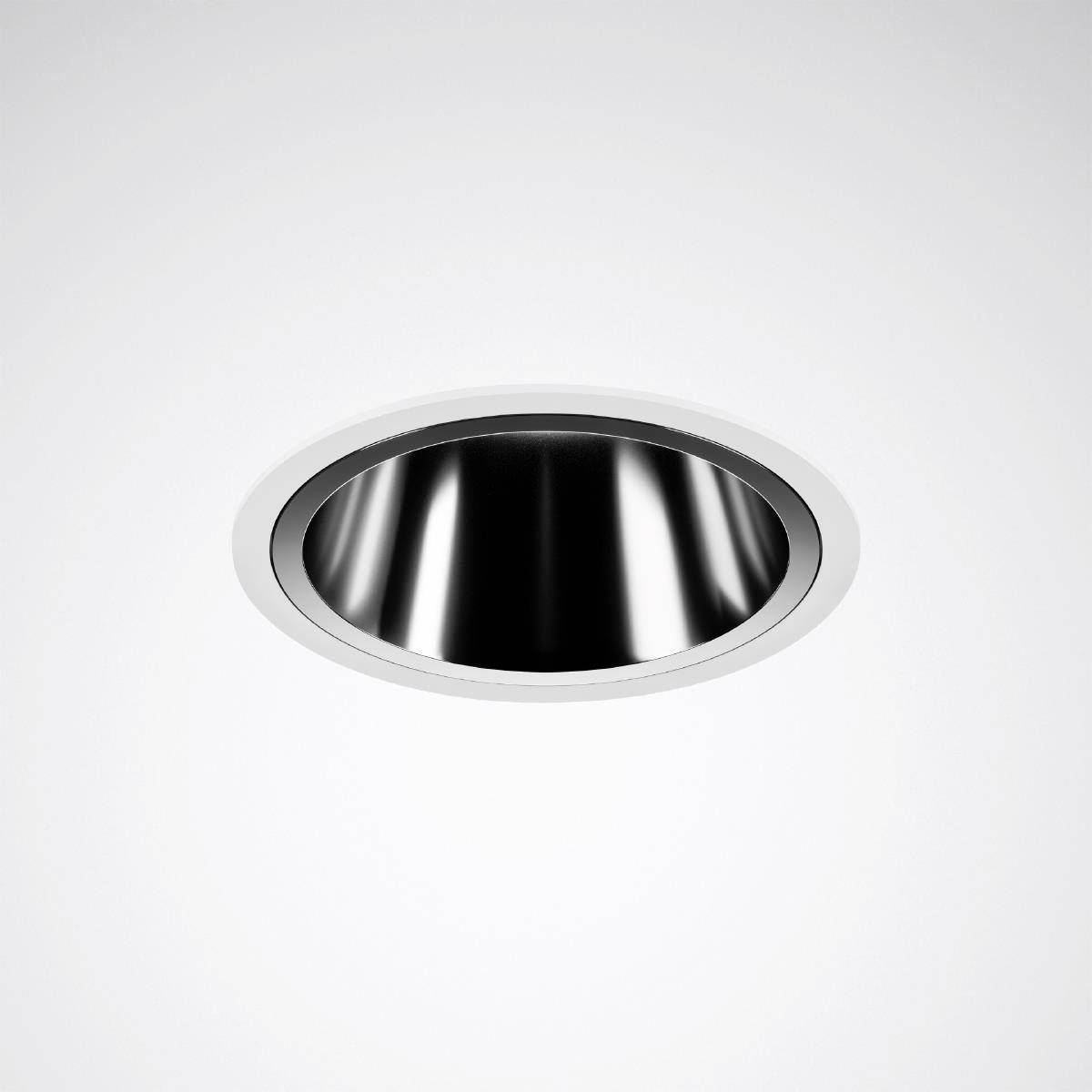 Einbaustrahler in einer weißen Decke, silbern glänzend und kreisförmig, ohne erkennbare Lichtquelle.