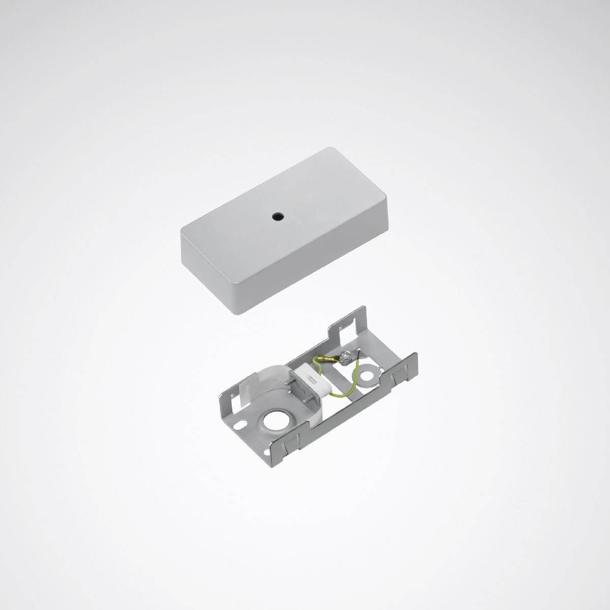 Ein grauer, rechteckiger elektrischer Anschlusskasten mit abnehmbarem Deckel; zeigt Innenansicht der elektrischen Kontakte.