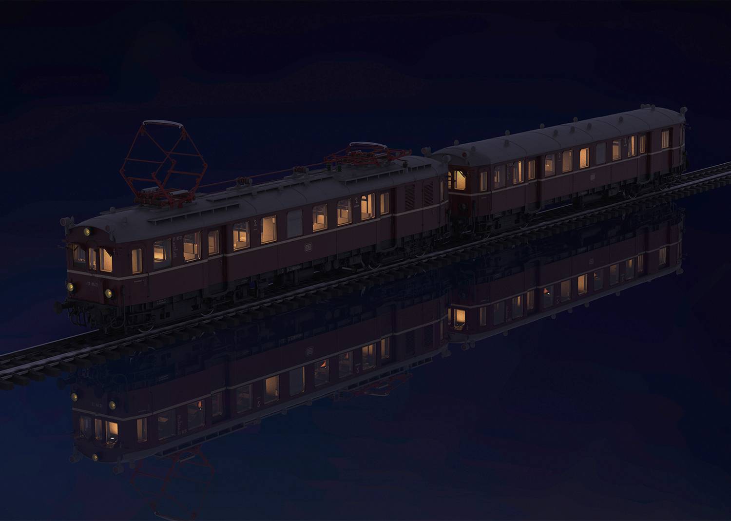 Ein beleuchteter Zug bei Nacht spiegelt sich im Wasser wider. Der Zug hat zwei Waggons und fährt auf einer Schiene unter klarem Himmel.