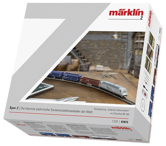 Ein Modelleisenbahn-Set der Marke Märklin im Maßstab 1:220 mit einem modernen Güterzug und einer Diesellokomotive BR 285, gekennzeichnet als Spur Z.