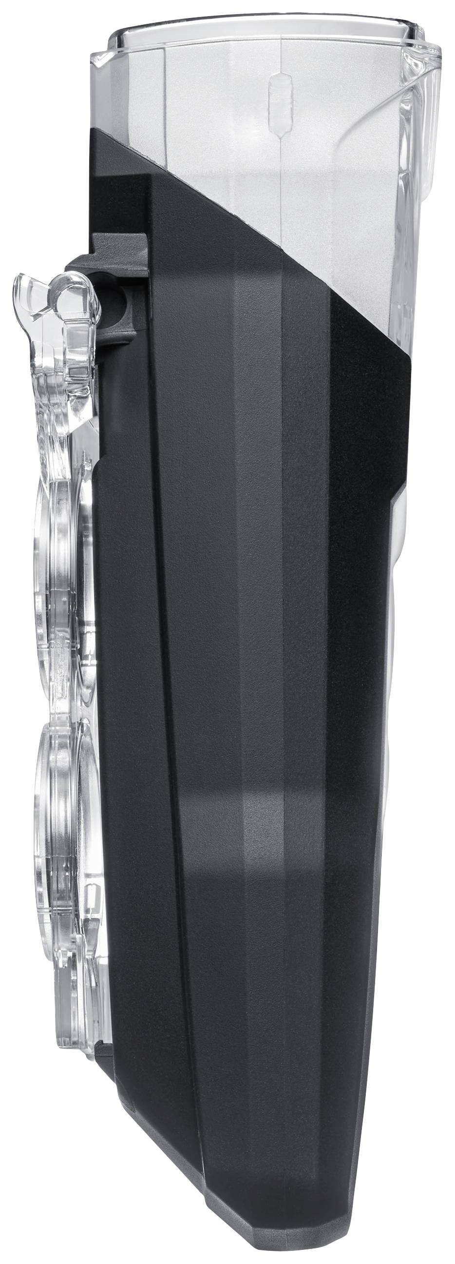 Elektrorasierer-Aufsatz, transparent und schwarz, mit strukturierter Oberfläche.