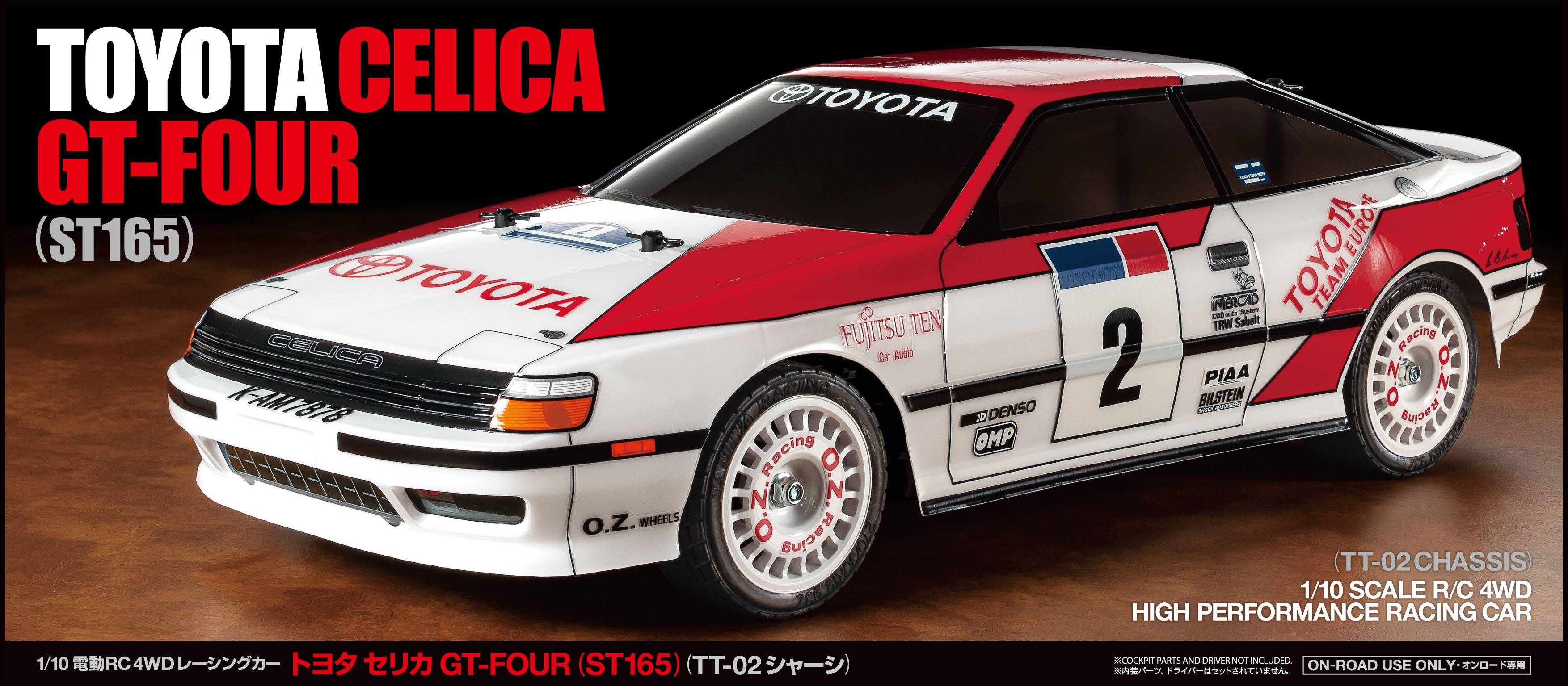 Ein weiß-roter Toyota Celica GT-Four (ST165) Modellauto im Rallye-Design mit der Startnummer 2. Links die Aufschrift 'TOYOTA CELICA GT-FOUR (ST165)'.