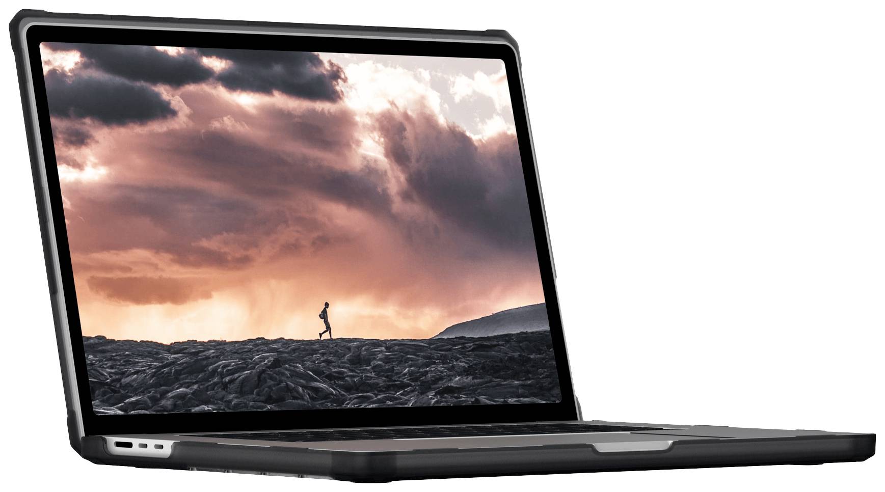 Ein Laptop mit einem Bildschirm, der ein Bild einer Person zeigt, die bei Sonnenuntergang über eine felsige Landschaft läuft.