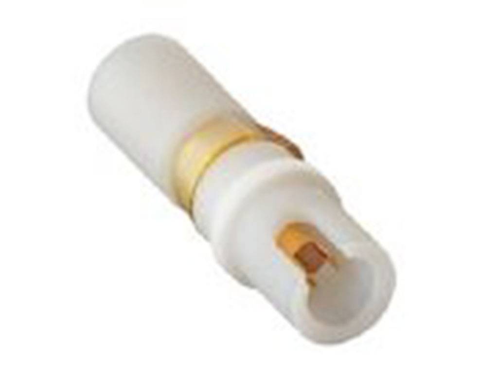 Ein weißer Kunststoff-Stecker mit gelben und kupfernen Elementen, der in elektrischen Anwendungen verwendet wird.