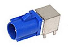 Blauer elektrischer Steckverbinder mit metallischem Gehäuse, seitlich dargestellt. Verwendet für elektronische Verbindungen.
