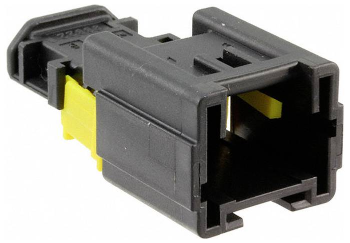 Ein schwarzer und gelber elektrischer Stecker mit rechteckiger Form, der Schlitze und Nuten aufweist, um eine sichere Befestigung in elektronischen Geräten zu ermöglichen.