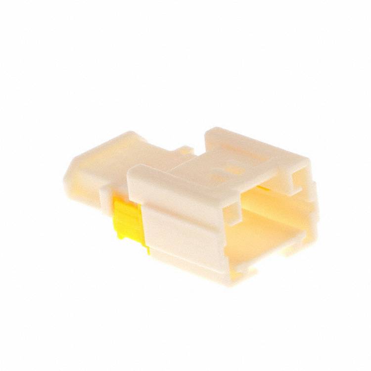 Eine Nahaufnahme eines weiß-gelben Kunststoffsteckers, möglicherweise für elektrische oder elektronische Verbindungen verwendet.