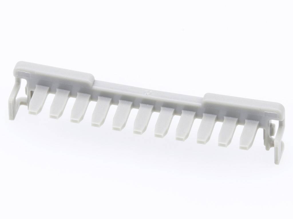 Ein graues Plastikteils, das als Kabelhalter oder Kabelorganisator dient, mit mehreren Schlitzen zum Einlegen von Kabeln.