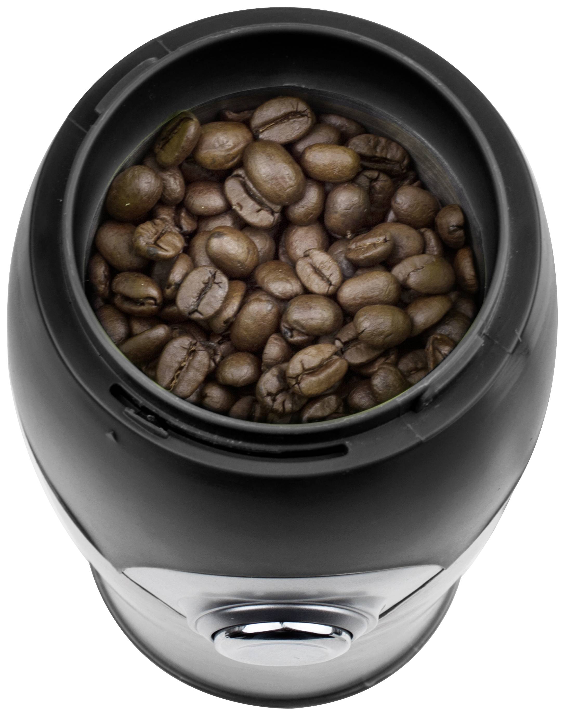 Schwarze Kaffeemühle mit Kaffeebohnen im Mahlbehälter, von oben betrachtet.
