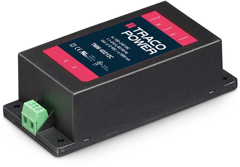 Ein schwarzer Traco Power-Wandler mit grünen Anschlussklemmen, Kennzeichnung 'TML 40212C', zeigt Leistungs- und Zertifizierungsinformationen.