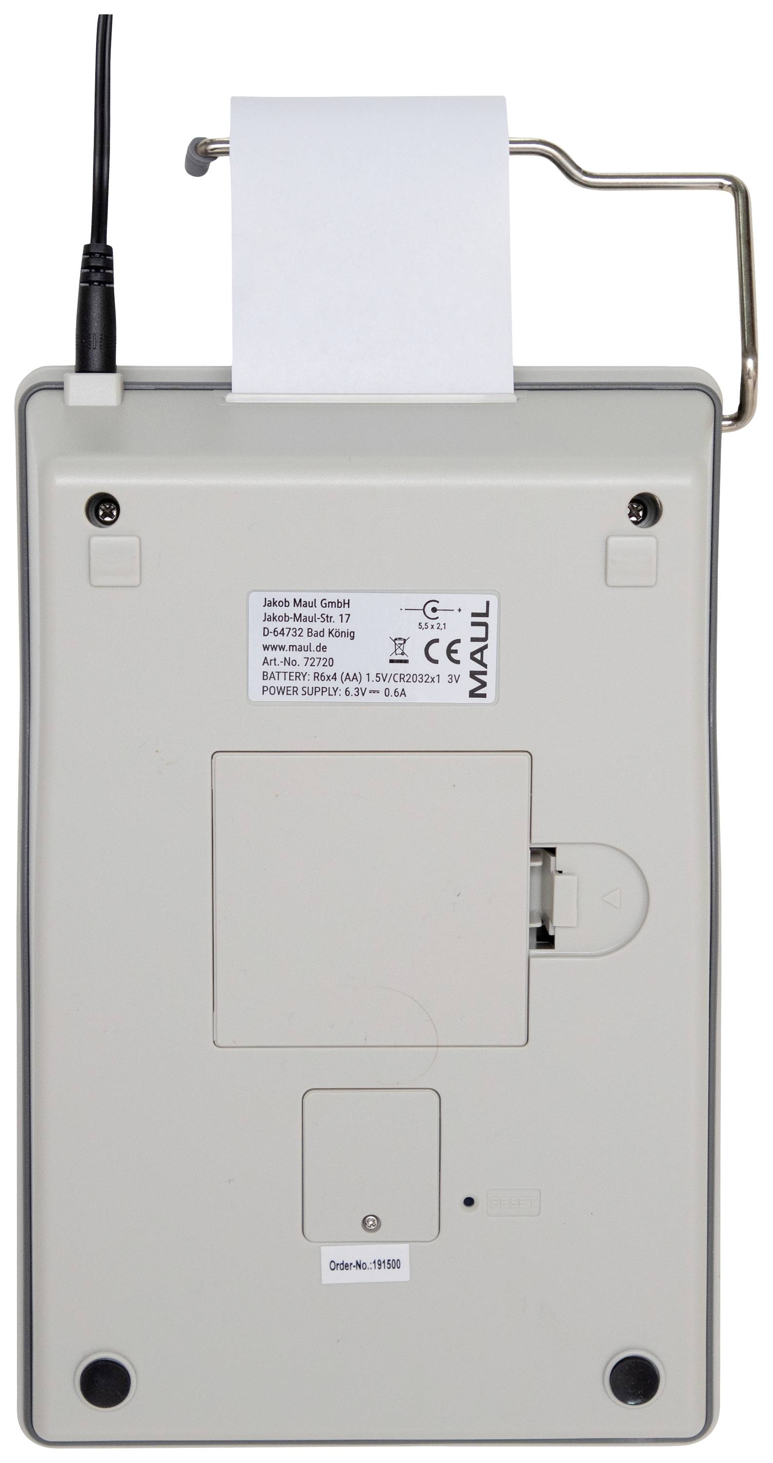 Rückseite eines elektronischen Geräts mit Papierrolle und Anschlusskabel. Geeignet für den professionellen Gebrauch.