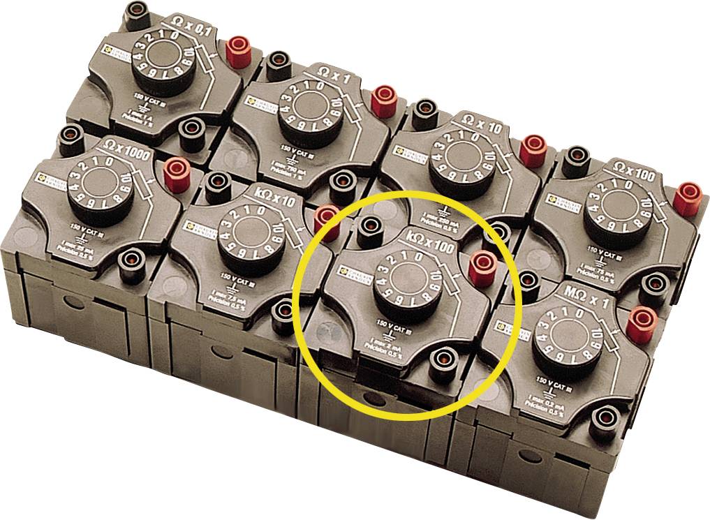 Acht elektromagnetische Ventile in zwei Reihen angeordnet, ein Ventil im Vordergrund ist gelb markiert.