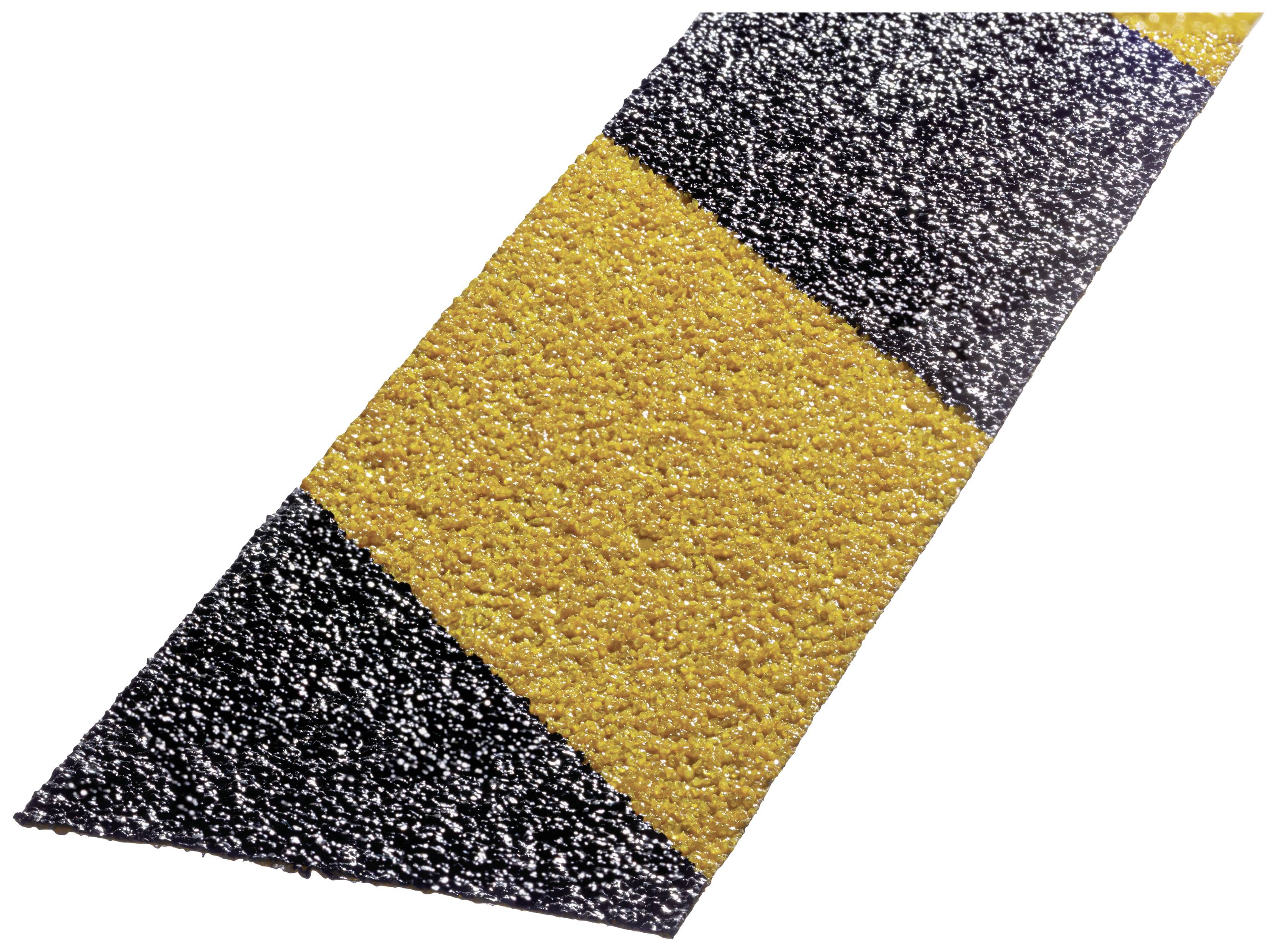 Schwarze und gelbe rutschfeste Streifen auf einem Sicherheitsbodenbelag.