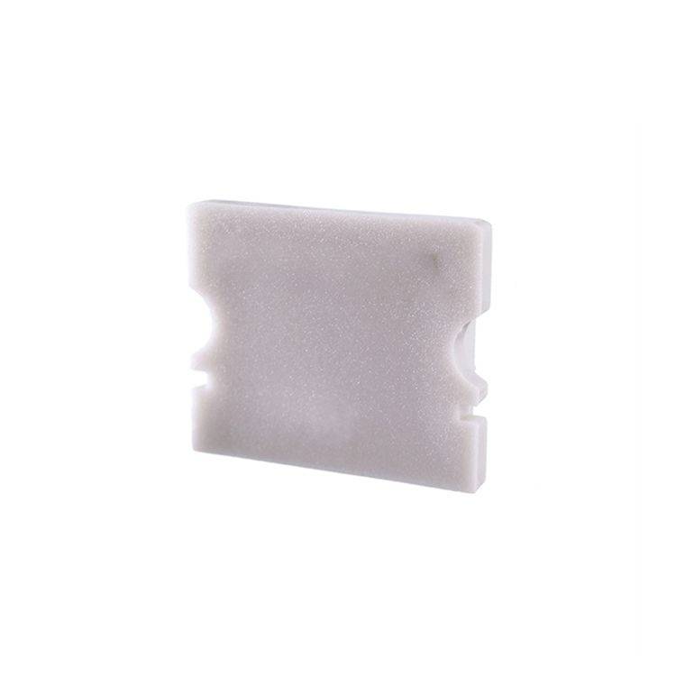 Ein rechteckiger, weißer Clip mit Einkerbungen an den Seiten, verwendet zur Befestigung von Brottüten.