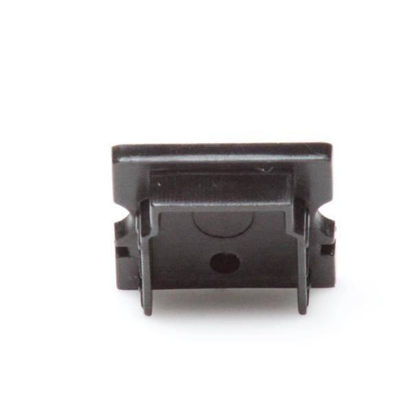 Schwarzes Kunststoffbauteil mit rechteckiger Form und zwei angespritzten Befestigungsstegen an den Seiten; dient zur Fixierung.