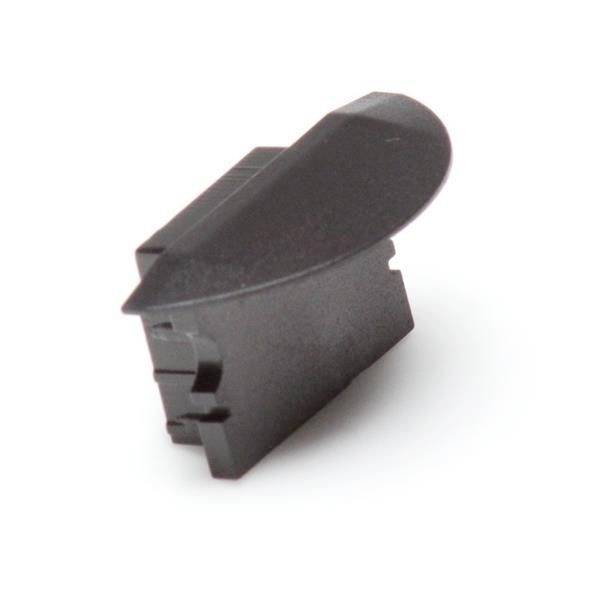 Ein schwarzer Kunststoffkeil, der möglicherweise als Abstandshalter oder zum Fixieren von Bauteilen verwendet wird.