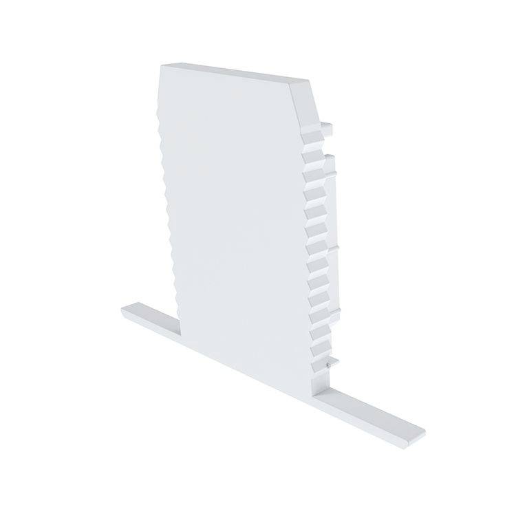 Ein weißes, rechteckiges Kunststoffteil mit gezackten Kanten steht auf einer Basis. Wahrscheinlich ein technisches Bauteil.