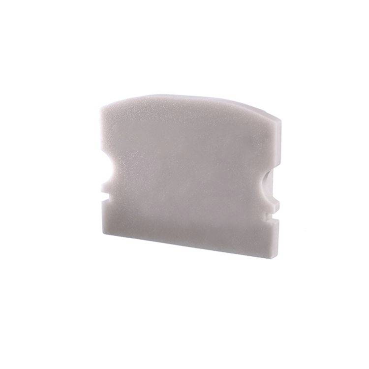 Ein rechteckiger, weißer Schleifstein mit abgerundeten Ecken und seitlichen Einkerbungen. Geeignet für präzises Schleifen.