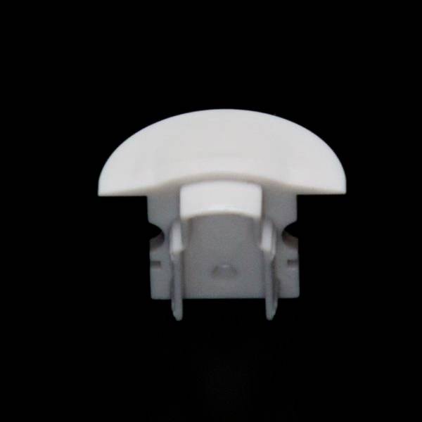 Weiße Kunststoff-Endkappe vor schwarzem Hintergrund, die vermutlich zum Abdecken von offenen Enden einer Montageleiste dient.