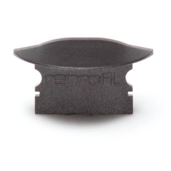 Ein schwarzes Kunststoffteil mit der Aufschrift 'reprofil'. Es hat eine gewölbte Oberseite und zwei Nutenaussparungen an den Seiten.