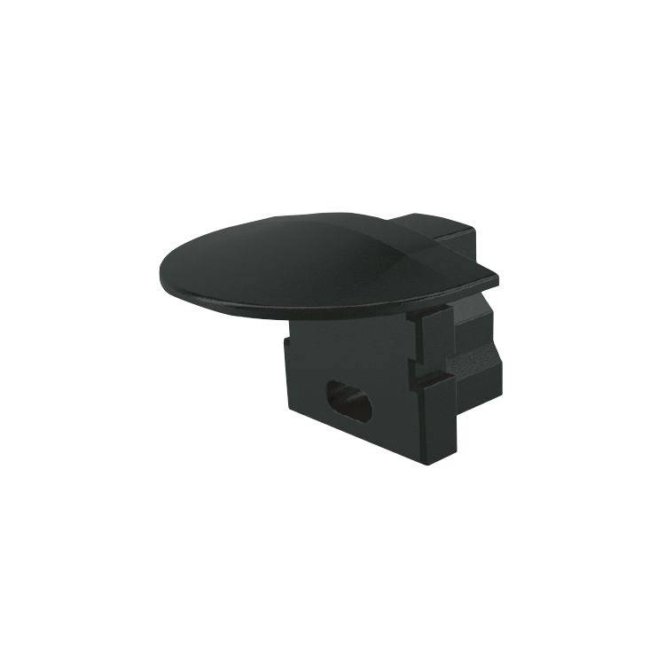 Ein schwarzes Kunststoffteil mit flacher, ovaler Oberseite und rechteckiger Basis, möglicherweise ein Verbindungselement oder Abdeckung.